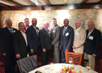 Memorial Board members with Chief Robert Contee