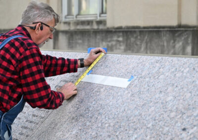 Engraving of Investigator Wayne David's name on the DC Police memorial
