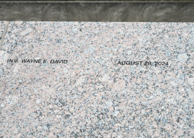 Engraving of Investigator Wayne David's name on the DC Police memorial